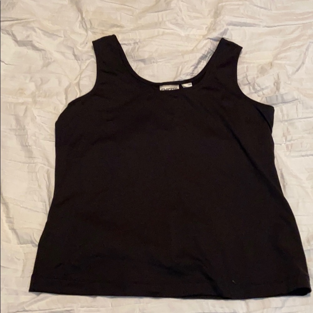 Loose fitting black top.